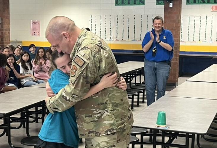 Sixes Elementary Student Warmly Welcomes Deployed Father Upon Reunion